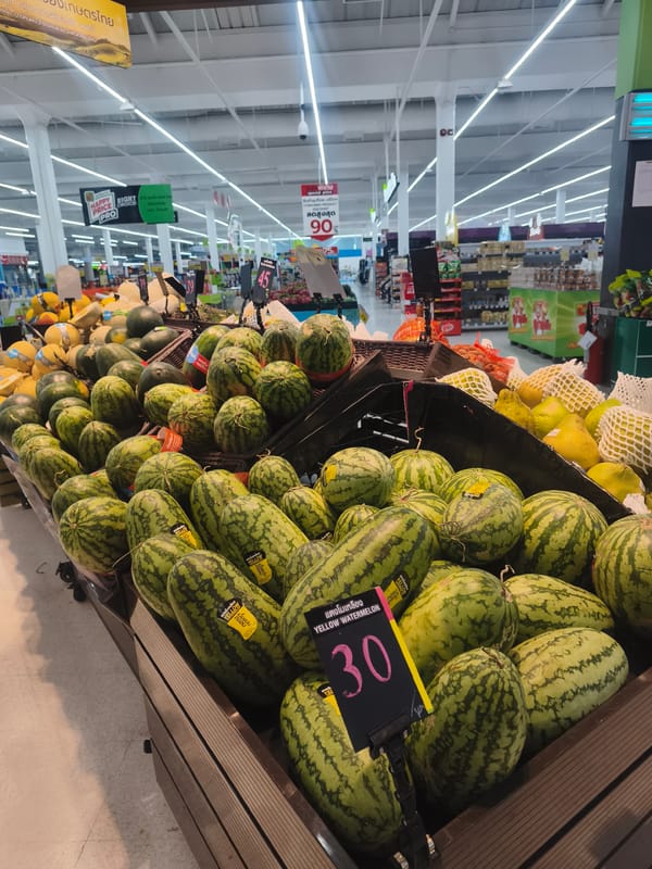 Thai retail stores documented with produce, goods displays