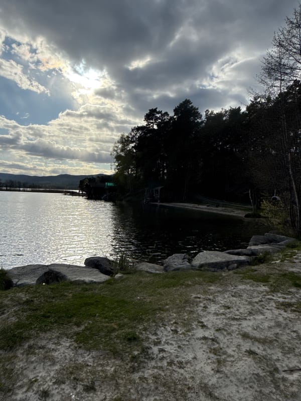 Tourist documents lakeside resort facilities at Zolotoi Plyazh, Russia