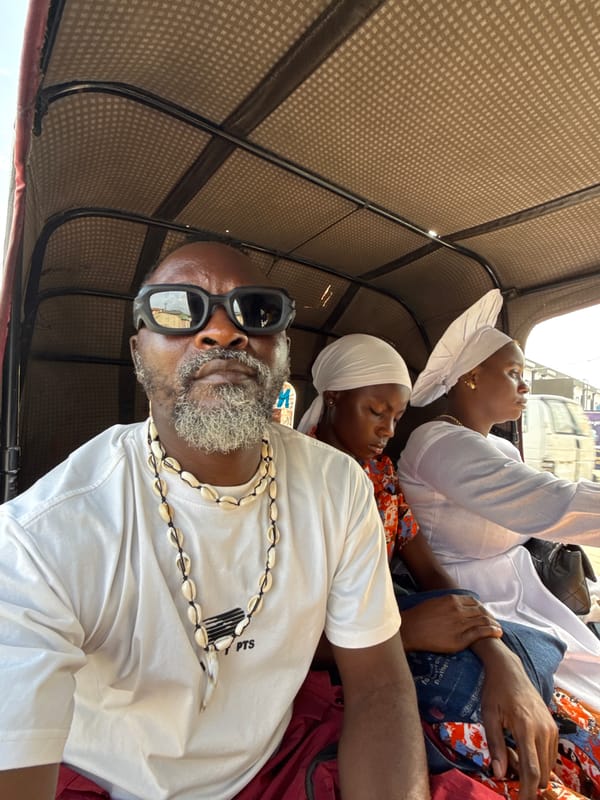 Women sleep in taxi during ride in Ado Nigeria