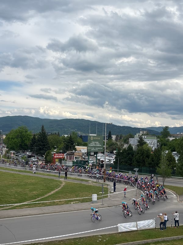 Urban cycling race and street activity documented in mountain city