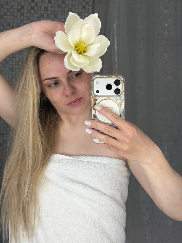 Woman takes bathroom mirror selfies in Votkinsk, Russia