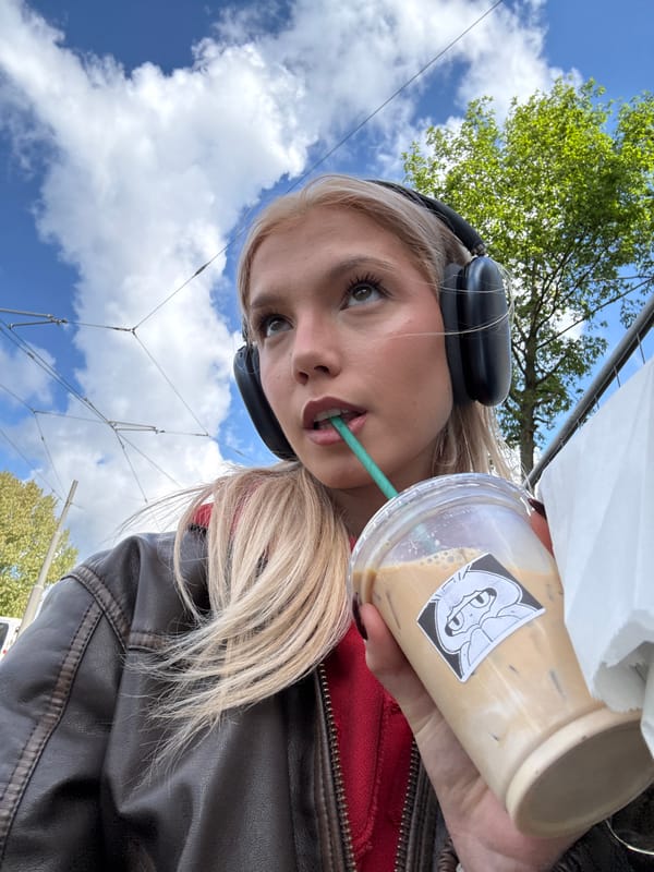 Woman enjoys morning coffee break in Antwerp