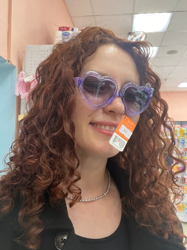 Woman spotted wearing heart-shaped sunglasses with price tag in St. Petersburg