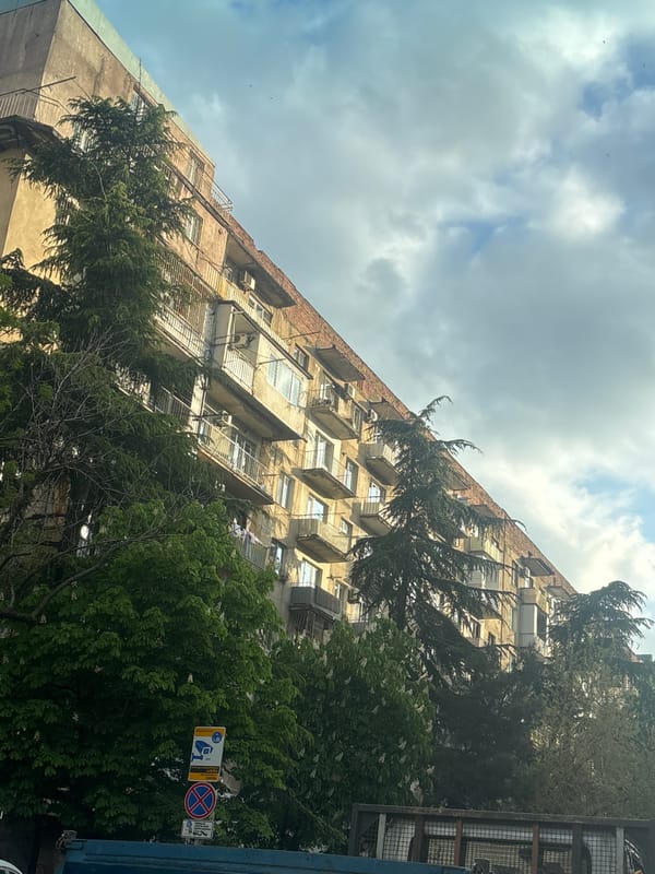 Street scenes documented during afternoon drive through Tbilisi
