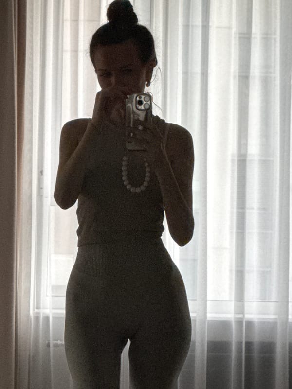 Mirror selfies captured in Khimki building during afternoon