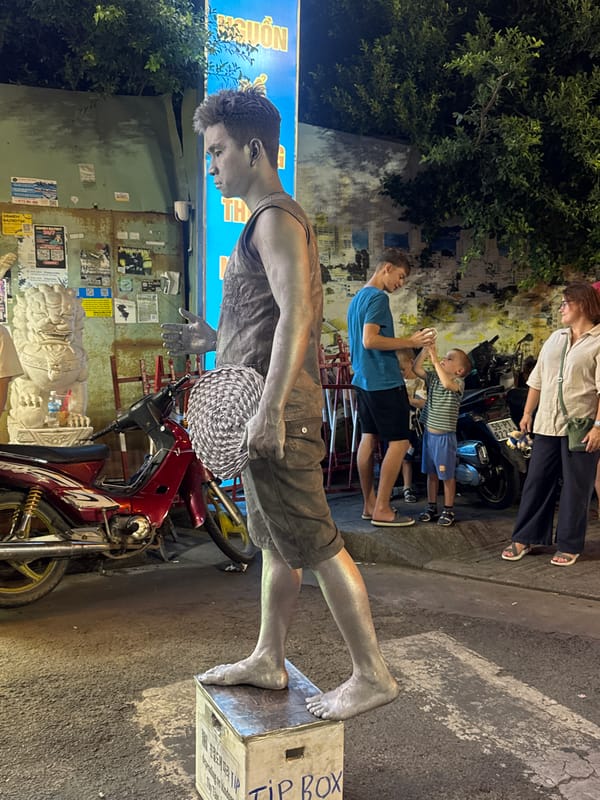 Nha Trang's waterfront at night: street performers, fountains, hotels