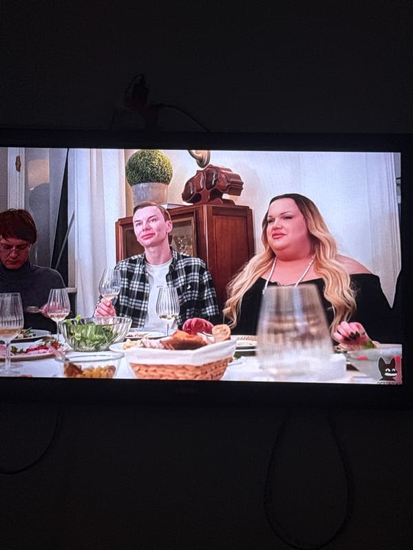 Three people dining indoors captured in Tel Aviv