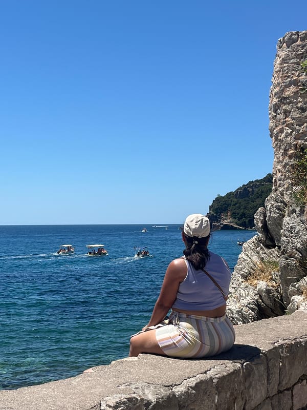 Tourists explore Budva's historic streets and Adriatic coastline