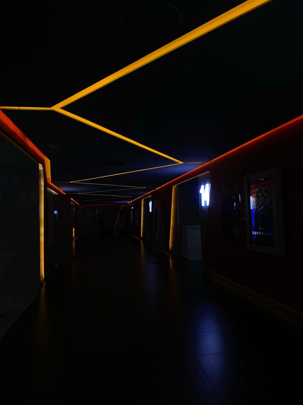 Modern corridor with bright yellow light strips documented