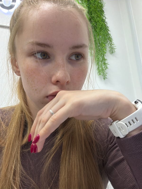 Woman takes selfies during laptop session in Usolye, Russia