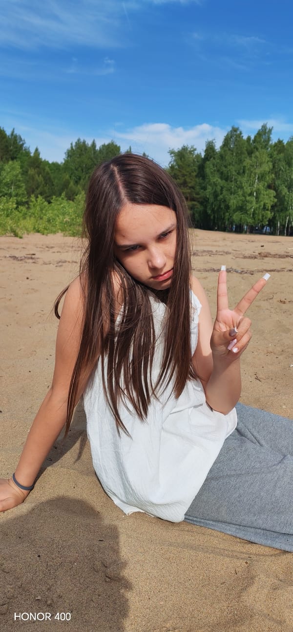 Families enjoy beach day activities in Noviy, Russia