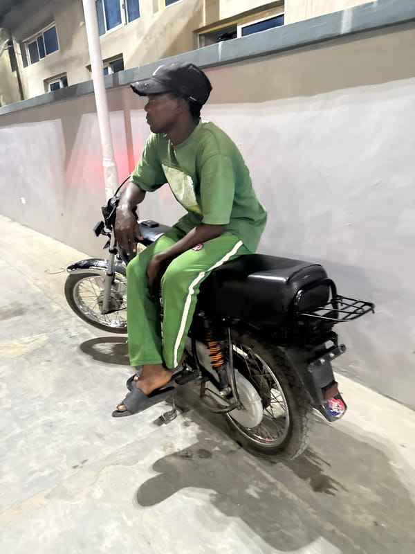 Evening street and retail life in Ado, Nigeria