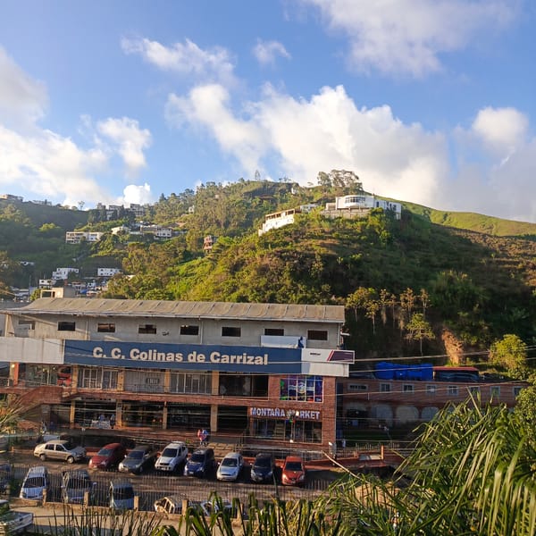 Street-level look at Carrizal's main commercial hub and surrounding roads