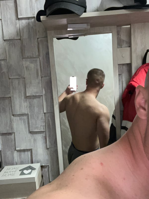 Man takes mirror selfie at home in Asenovgrad