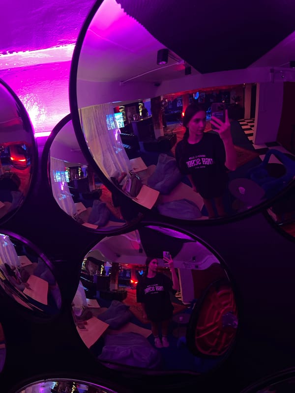 Visitor documents mirror art installation at Phuket lounge venue