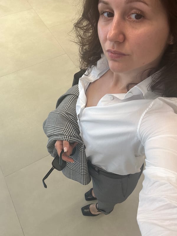 Woman in office attire observed at Dubai workplace