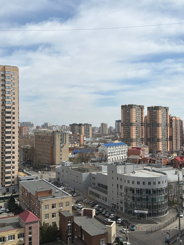 Aerial views document residential streets and parking in Azov