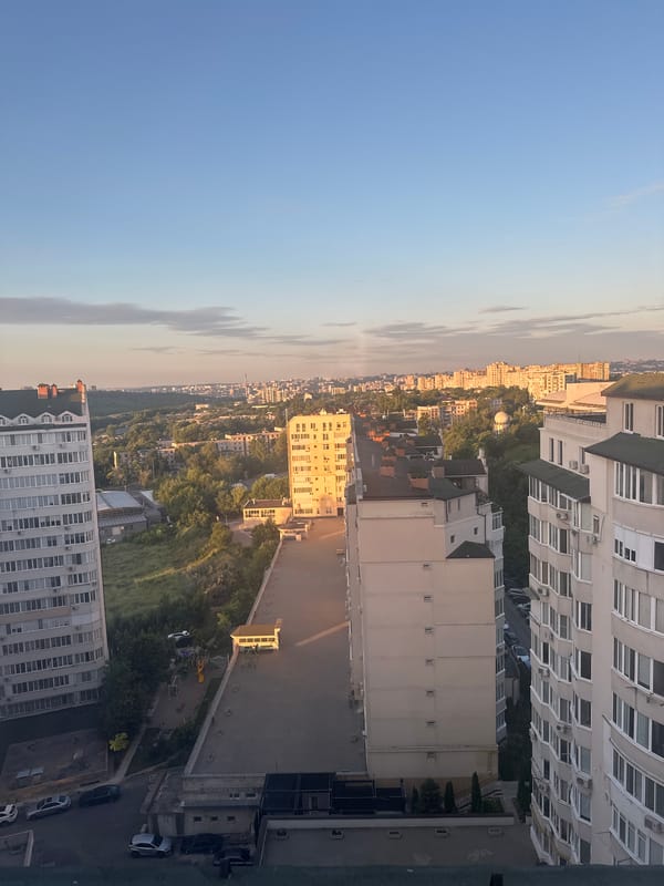 Golden hour aerial over Chișinău's residential neighborhoods