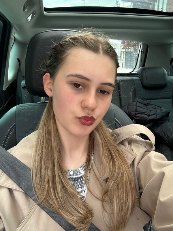 Woman takes car selfies in Panagyurishte, Bulgaria