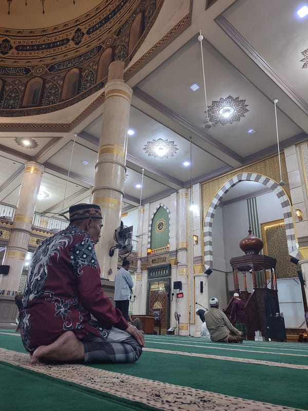Worshippers gather for prayers at Banda Aceh's grand mosque