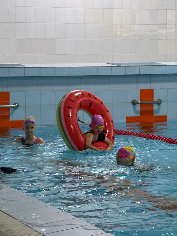 Kids' swim lesson in progress at Birobidzhan indoor pool