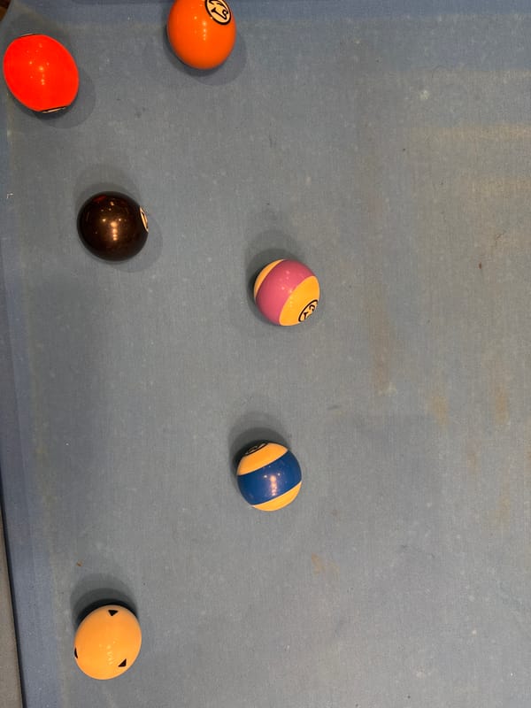 Pool game captured during evening hours in Bellville