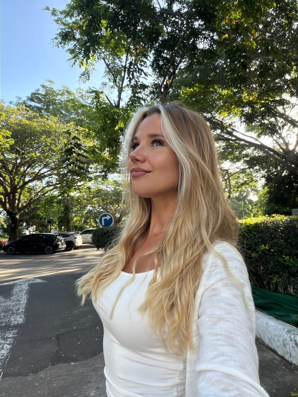 Selfies and street scenes near Karon's white Buddha statue