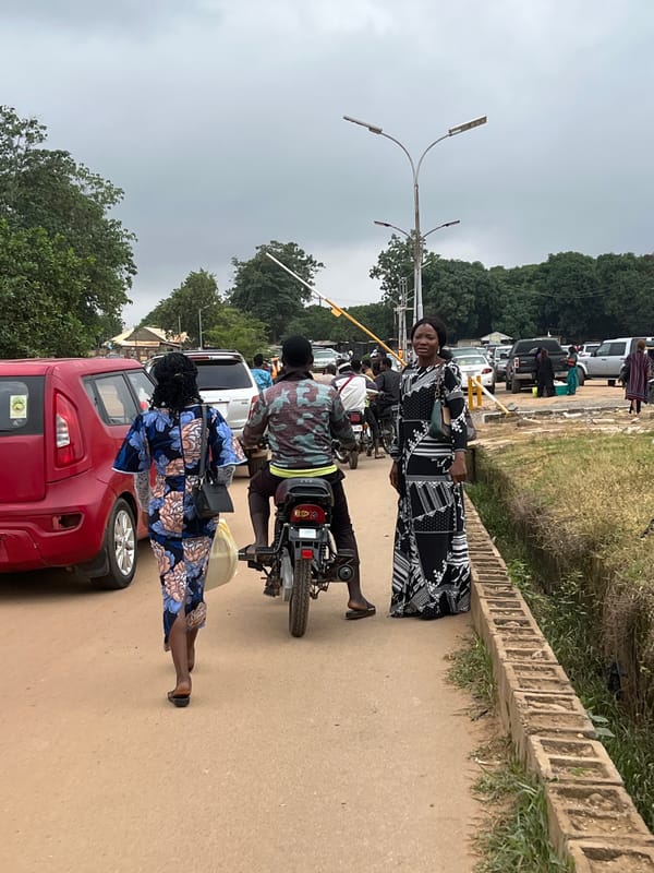 Morning foot traffic near a church in Abuja, Nigeria