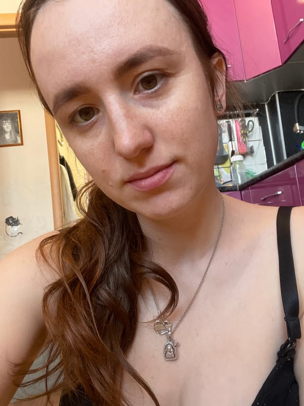 Woman photographed in kitchen setting in Podstepki, Russia