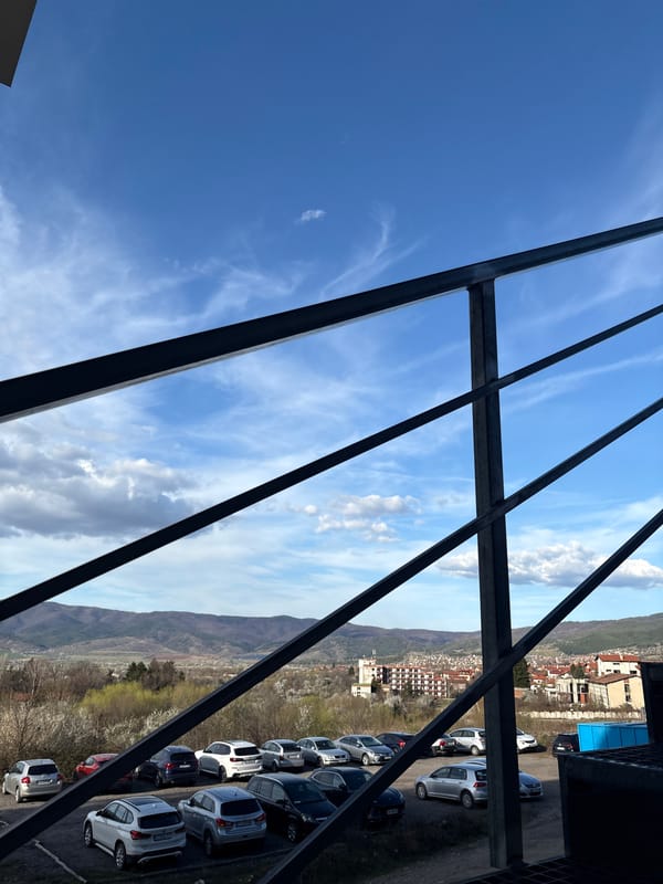 Elevated view captured through metal framework in Sapareva Banya