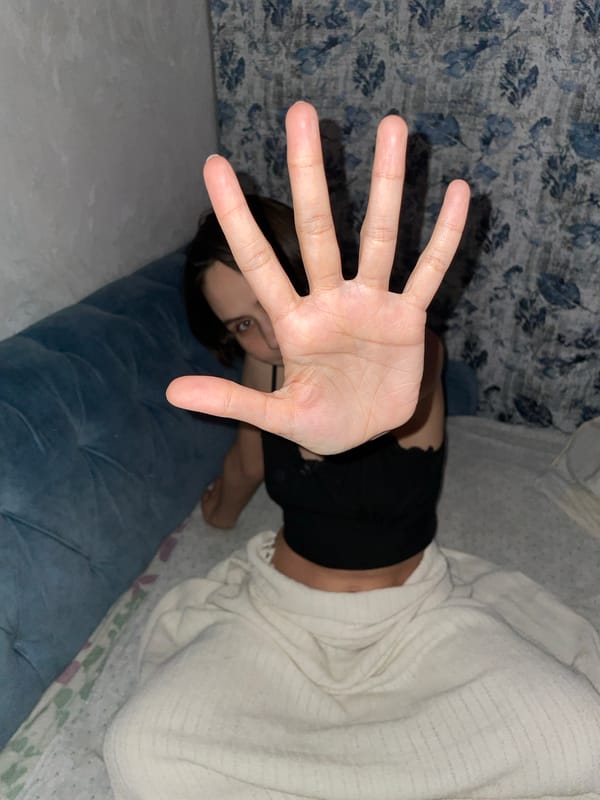 Person photographed on bed in Izhevsk, Russia
