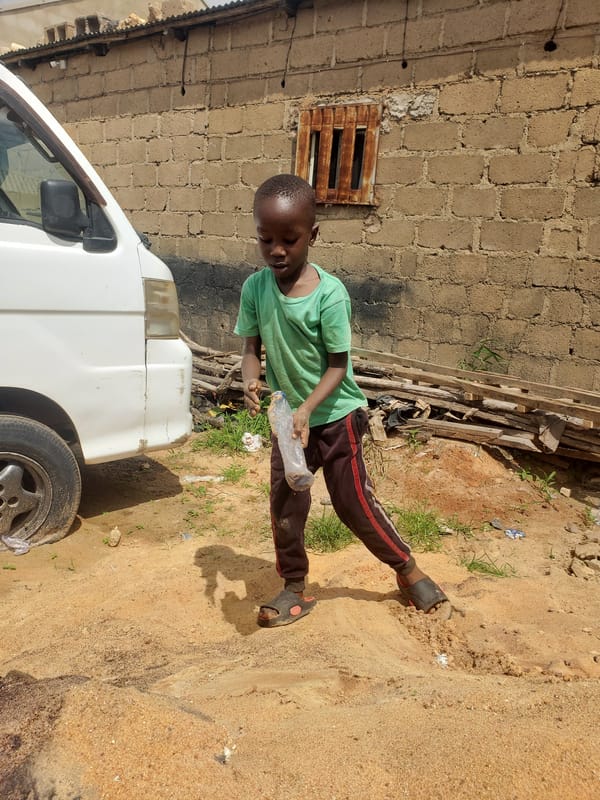 Boy spotted near white van in street area