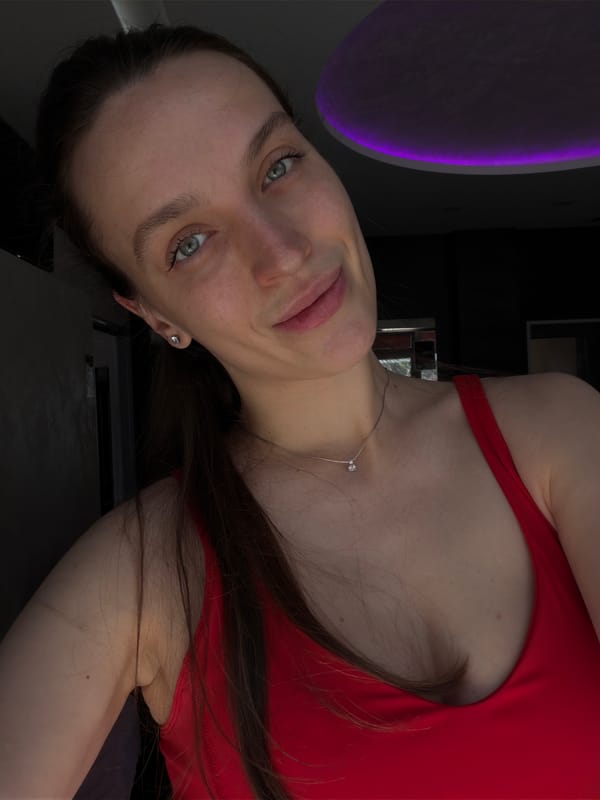 Woman in red workout gear photographed at Budva gym