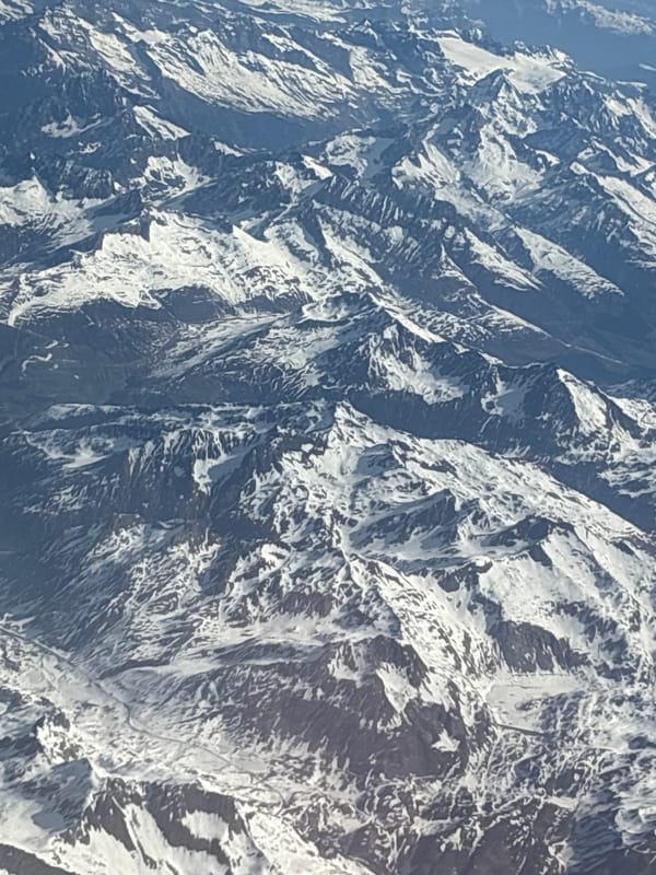 Snow-dusted Alpine peaks observed in northern Italy mountains