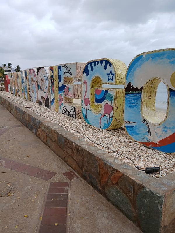 Visitor documents leisurely beach moments in Juan Griego, Venezuela