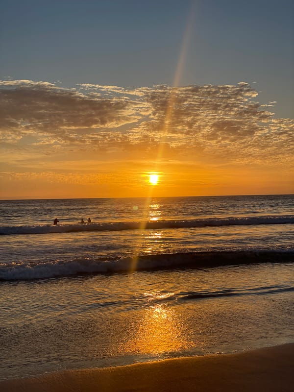 Sunset observed over ocean at Iquique beach, Chile