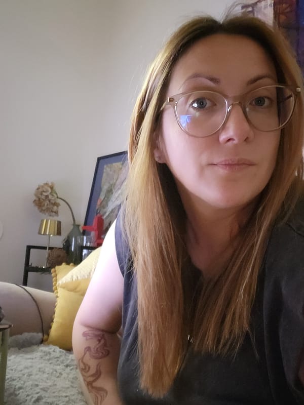 Woman and Papillon dog share quiet moments at Budva home