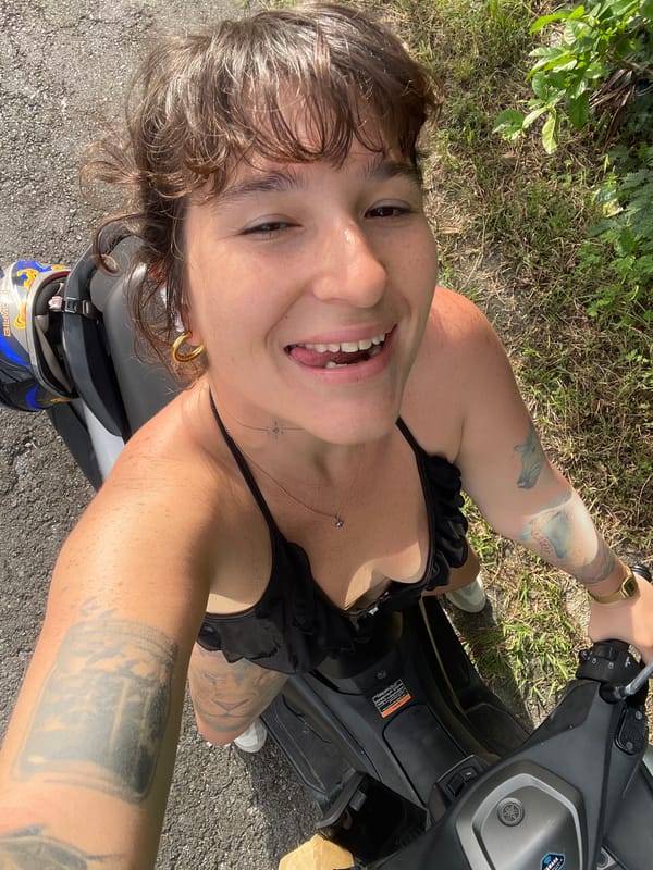 Lazy morning in Rawai with a scooter and a fluffy dog