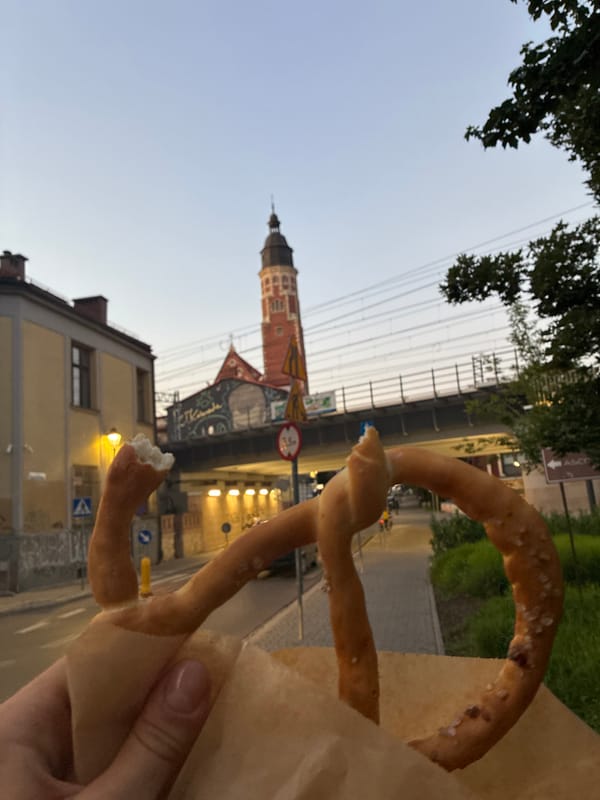 Pretzels and gothic spires on a Kraków evening