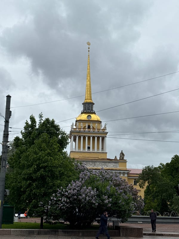 Spring blooms frame Admiralty spire in Saint Petersburg