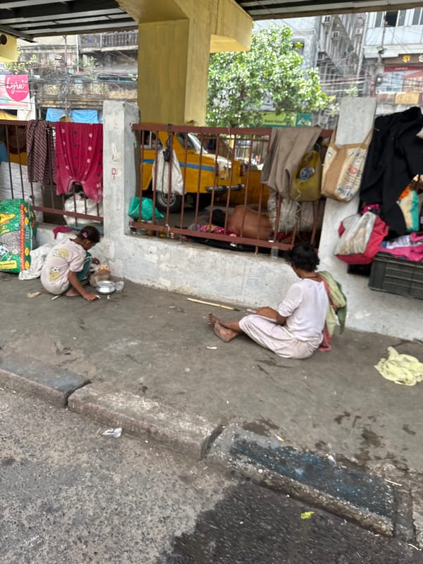 Early morning street life observed across Kolkata walkways