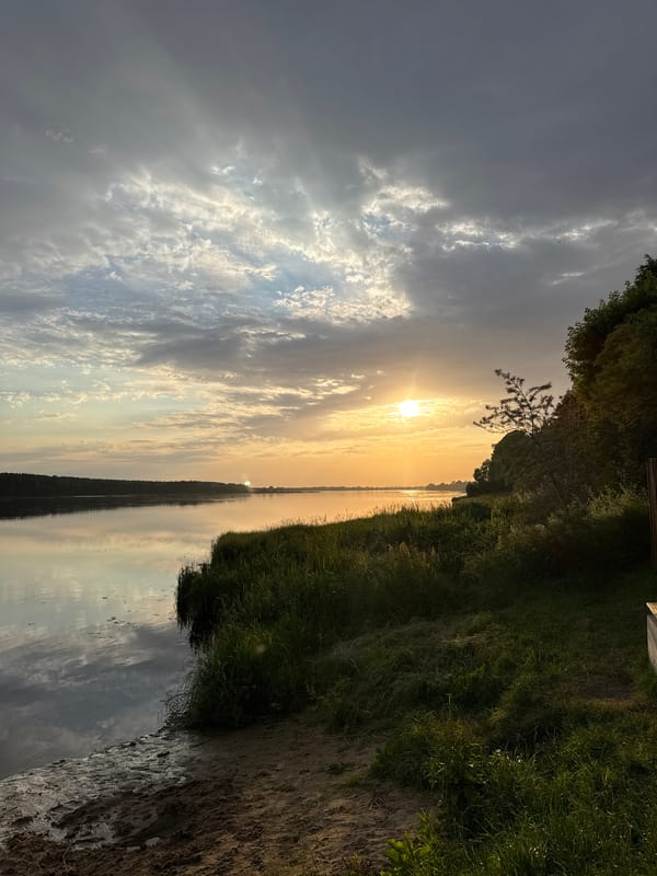 Sunset to nightfall along the Riga riverfront