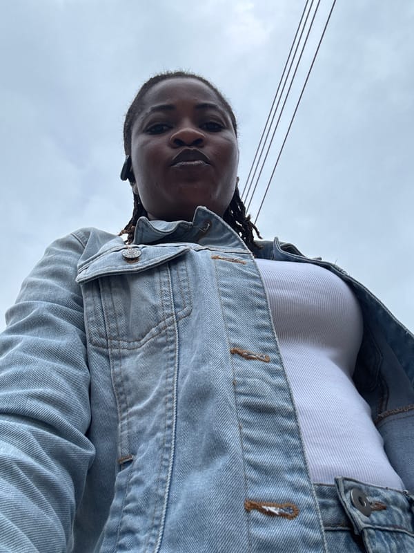 Morning selfie series in Ajara, Nigeria, overcast skies overhead