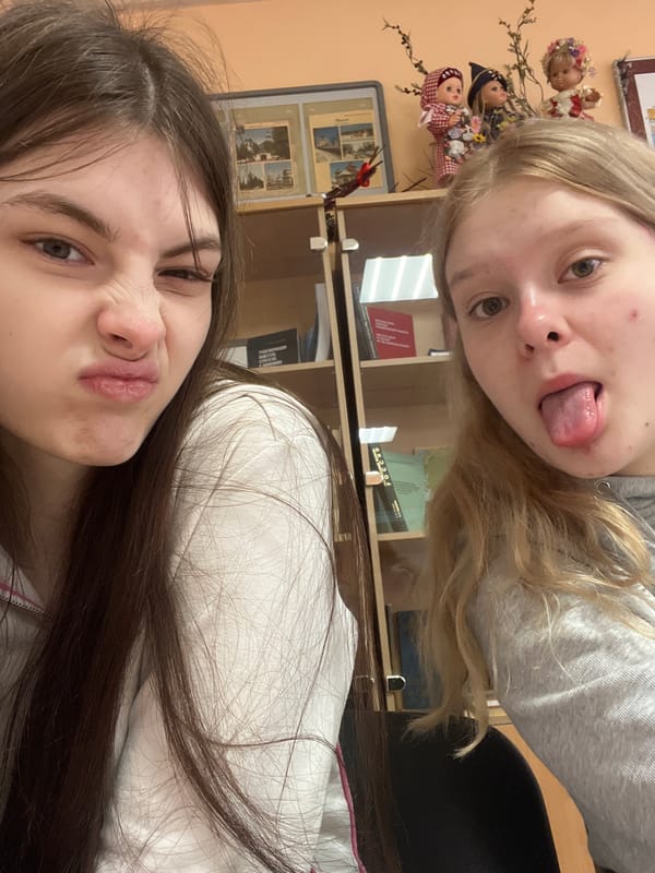 Students celebrate third-place diplomas with selfies in Saint Petersburg