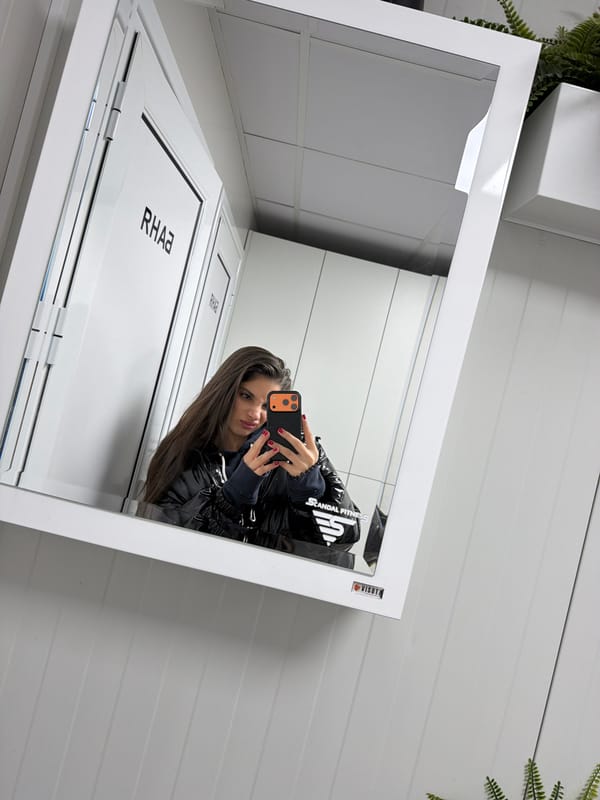 Friends take mirror selfies at gym in Bulgaria