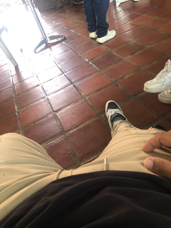 Three pairs of sneakers spotted indoors in Venezuelan town