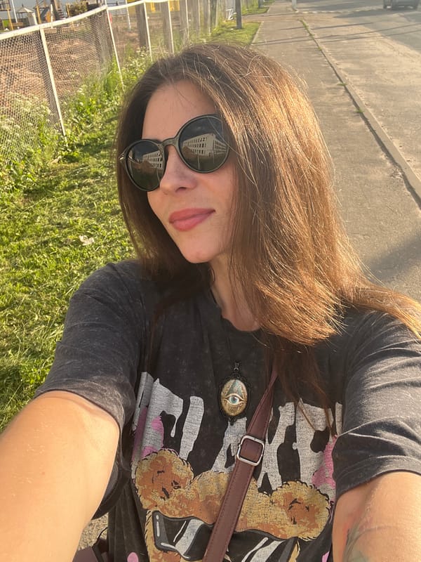 Afternoon selfie session along a sunny Krasnoe-na-Volge walkway