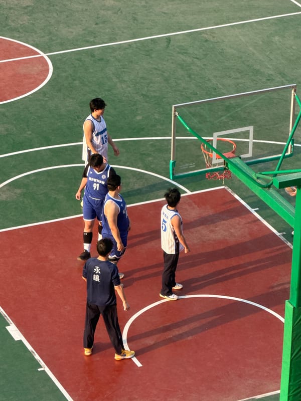 People lying on basketball court in Daxing District captured