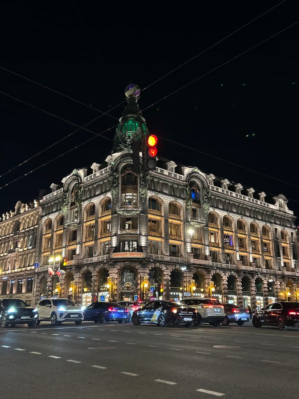 Evening street life documented in historic Saint Petersburg district