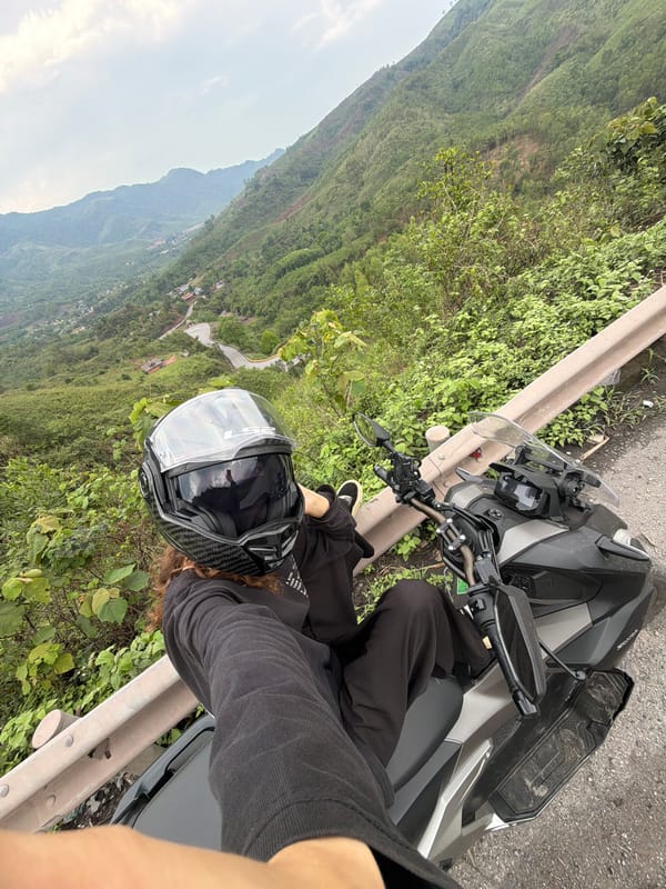 Motorcyclist pauses roadside in La Lay Commune, Vietnam